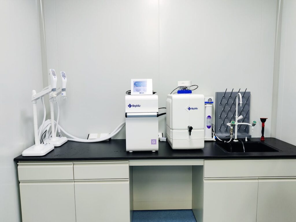 pexels-photo-7298544 High-tech water purification system set up in a laboratory environment.